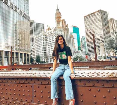 Participant sitting on the Brooklyn Bridge